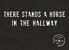 there stands a horse in the hallway